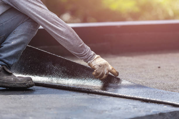 Professional Waterproofing technician working in Haysville, KS